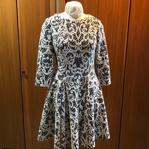 Elija J “embossed” knit dress